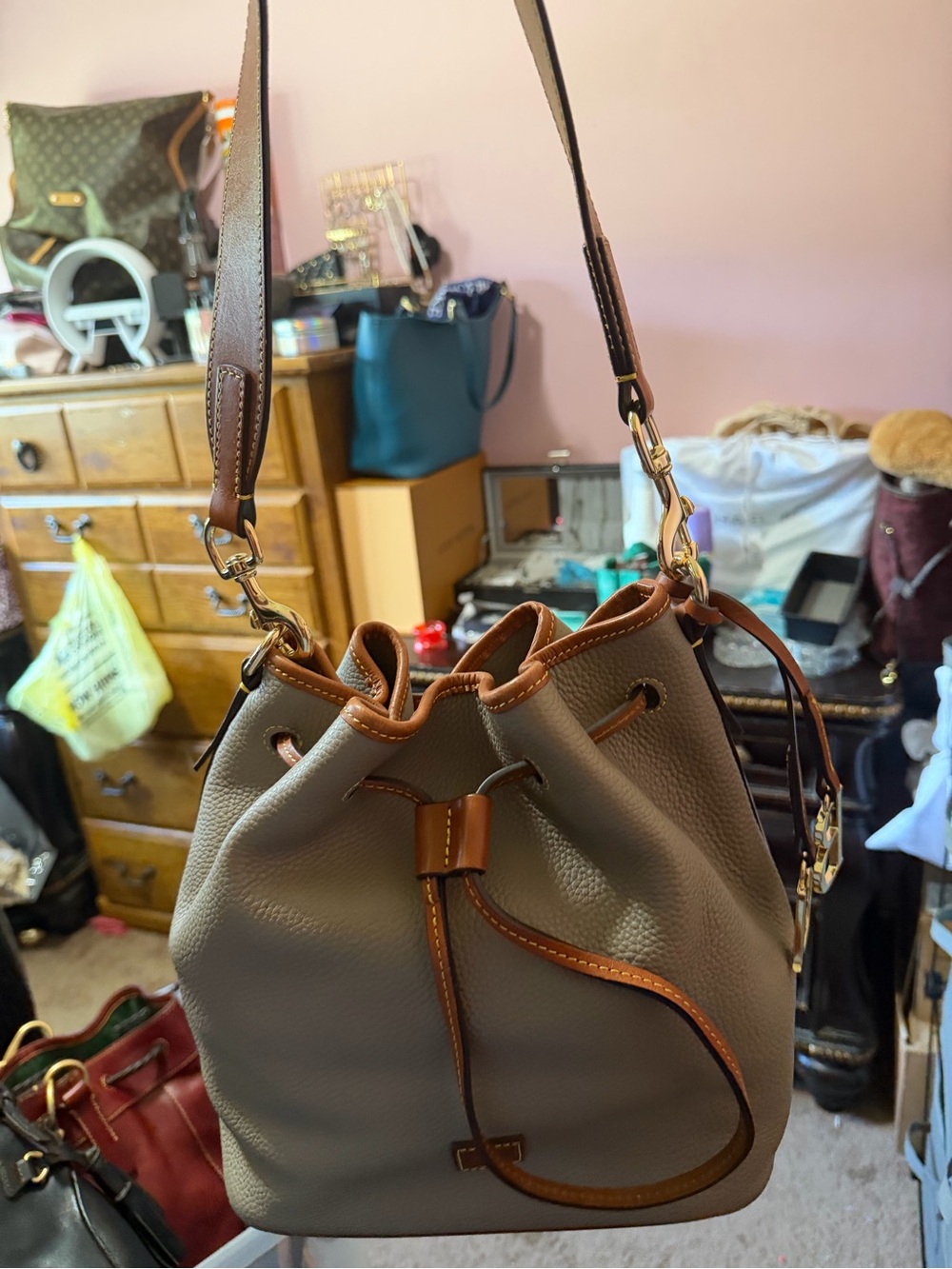 Dooney & Bourke Taupe Pebbled Leather Drawstring Bucket Bag with Brown Trim